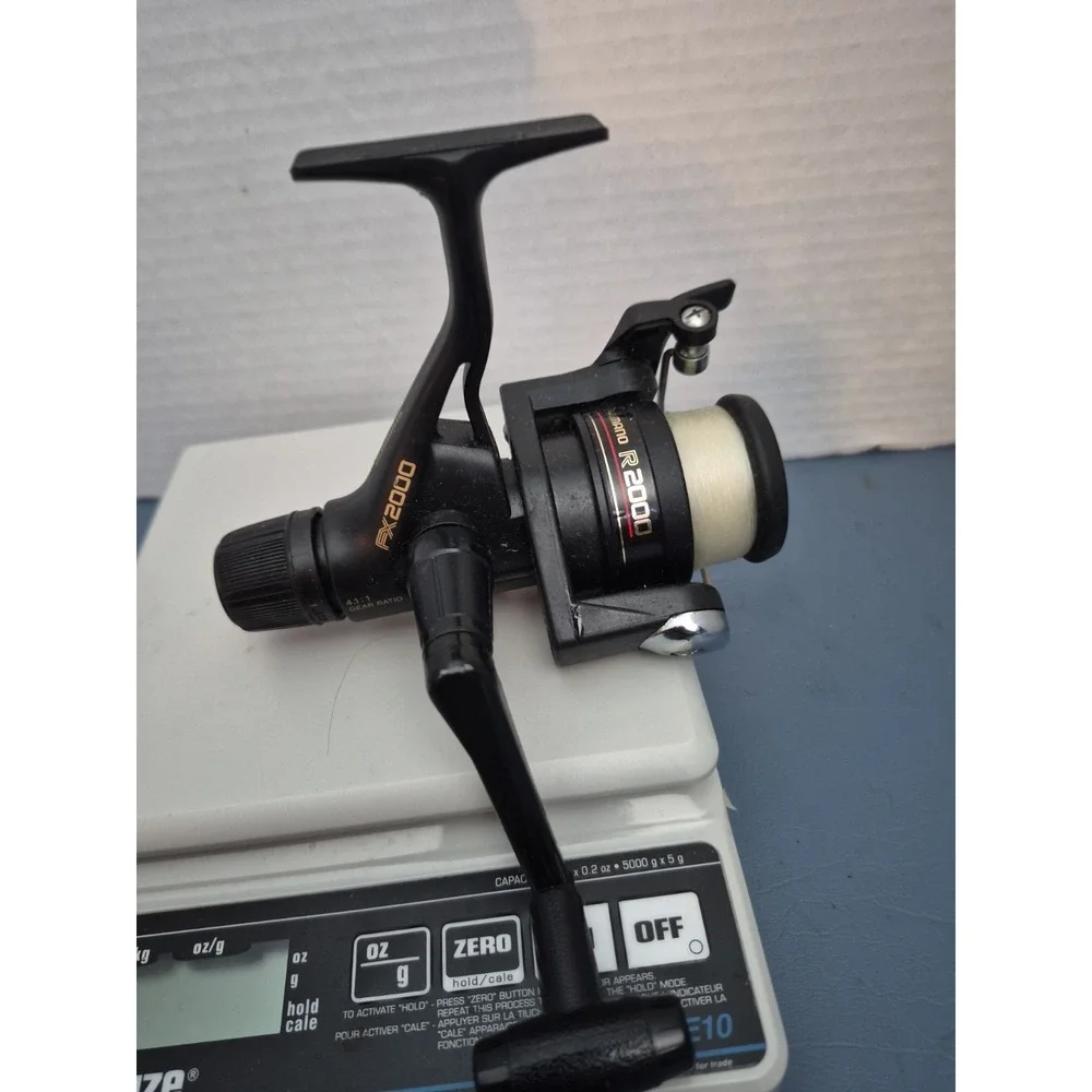 Shimano FX2000 REAR DRAG FISHING REEL SPINNING REEL